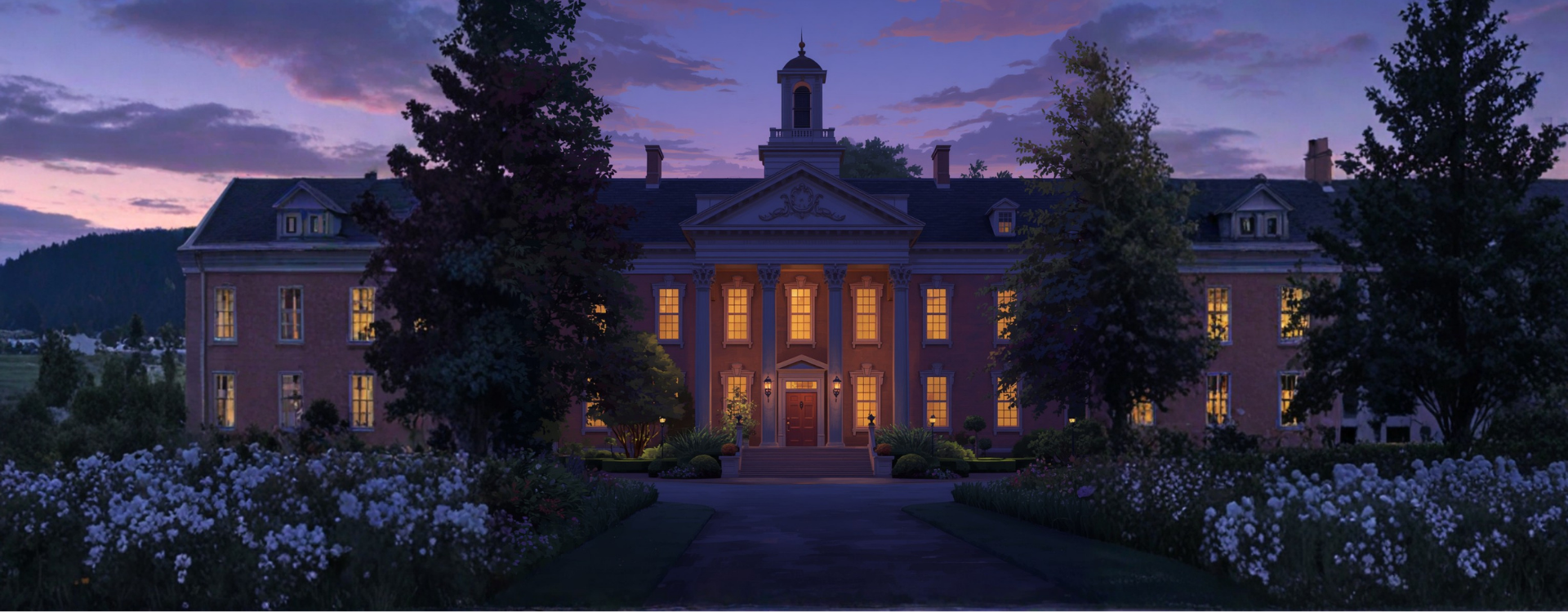 A small arts academy at dusk. A brick building with tall studio windows lit warm from within, lavender garden beds along the path, the sky deep plum behind.