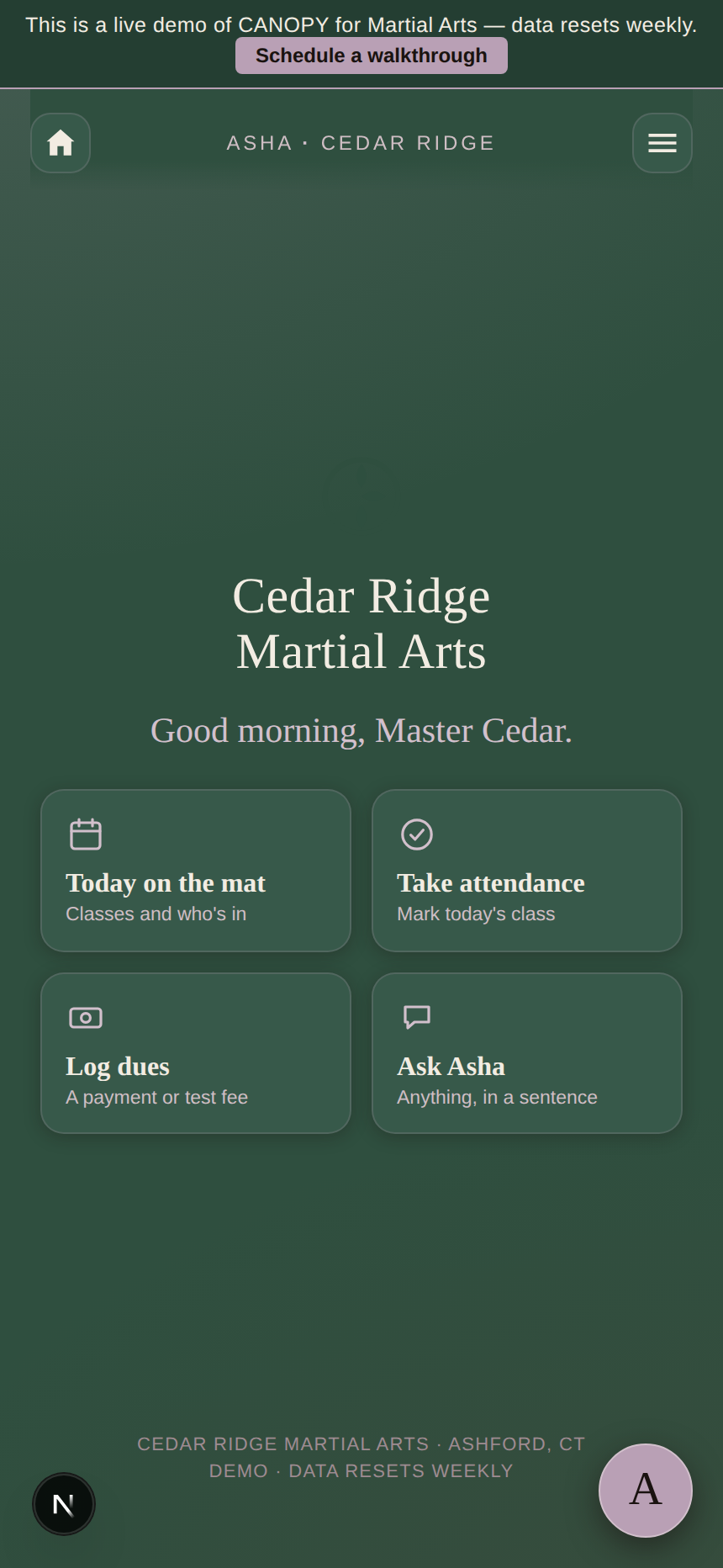 The Cedar Ridge Martial Arts home screen on a phone. The school name centered at the top, the greeting &lsquo;Good morning, Master Cedar,&rsquo; and four quick-action cards: today on the mat, take attendance, log dues, ask Asha.